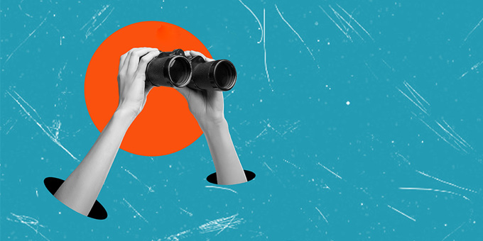 person holding binoculars